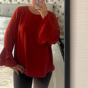 Red bell sleeve blouse
